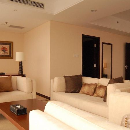 Joy City Hotel & Apartment Beijing Room photo